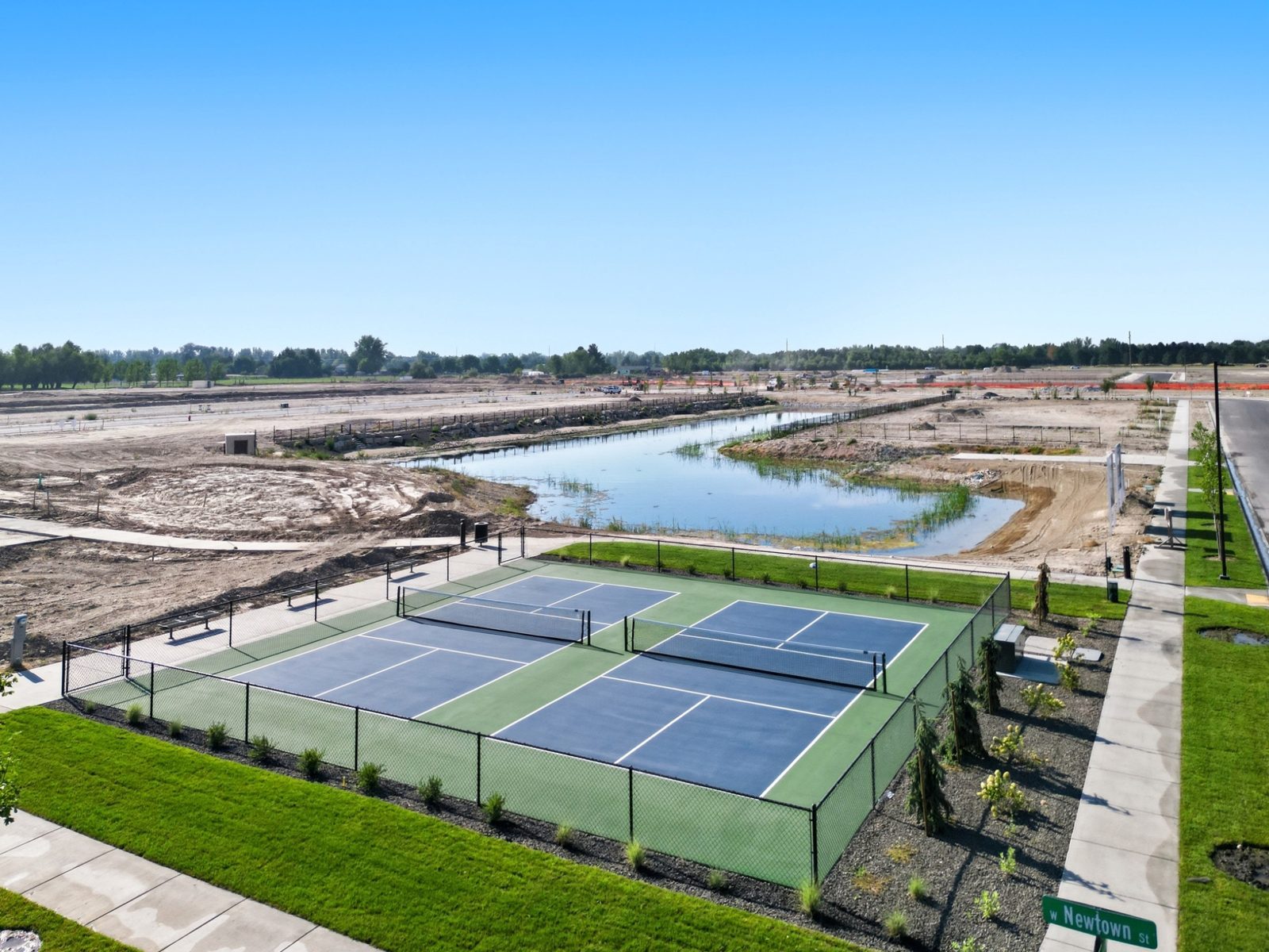 Aerial view of Eagledale pickleball courts and pond in Eagle, Idaho
