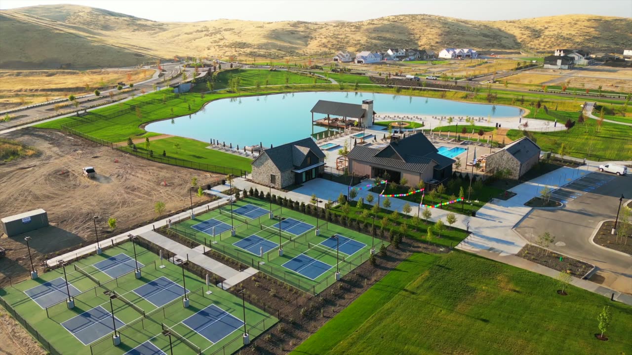 Community lake, recreation area and foothills at Valnova in Eagle