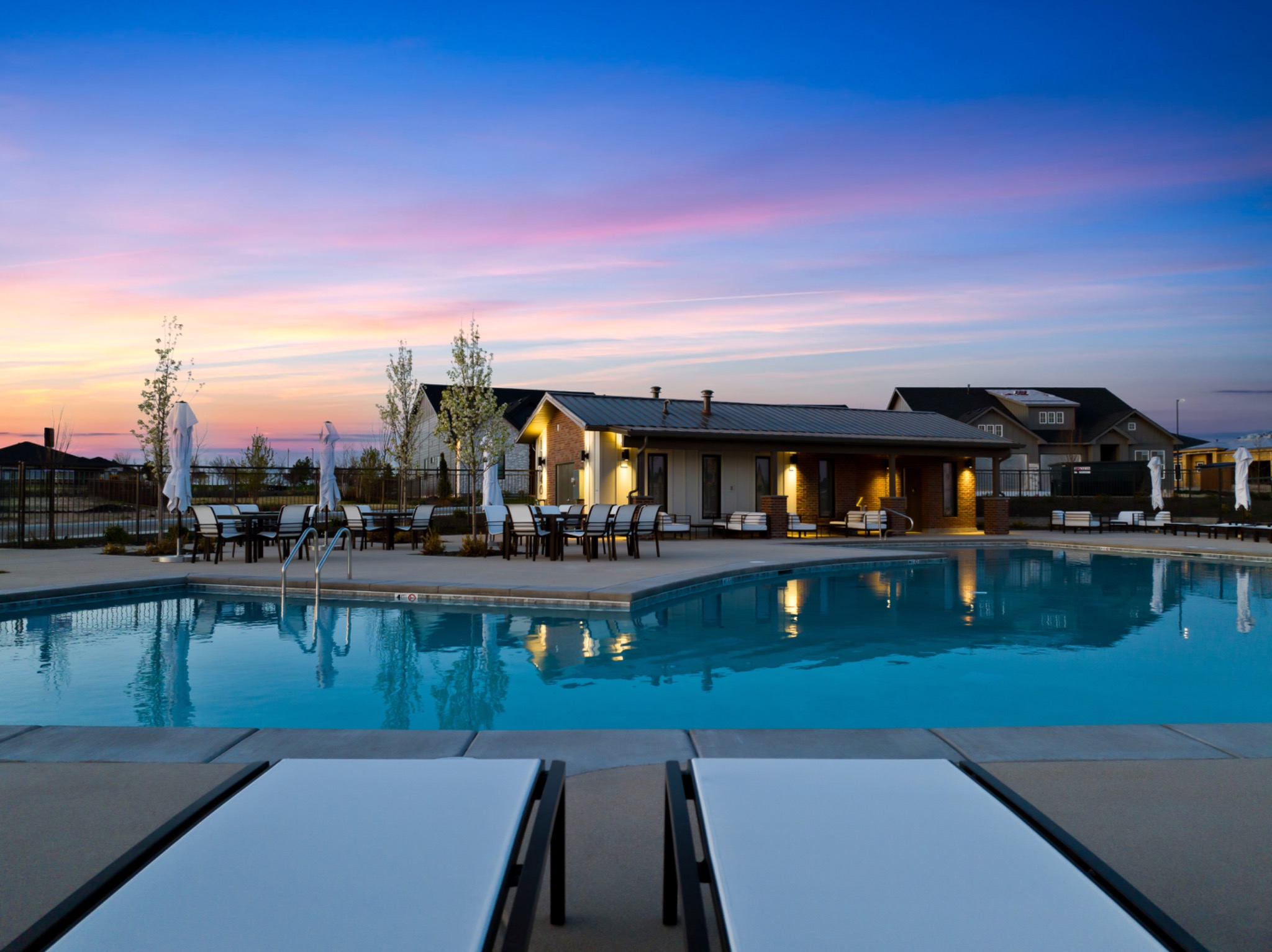 Reveille at Valor pool and clubhouse at twilight